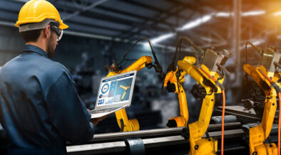 Worker controlling manufacturing automation in factory