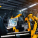 Worker controlling manufacturing automation in factory