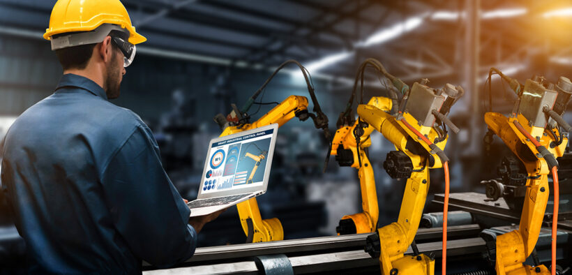 Worker controlling manufacturing automation in factory