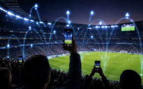 Fans uploading data at a stadium using phones
